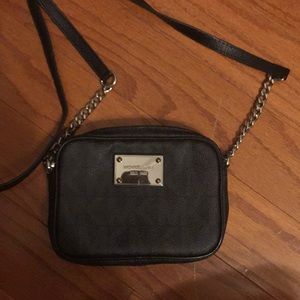 Black small purse. Silver accents.